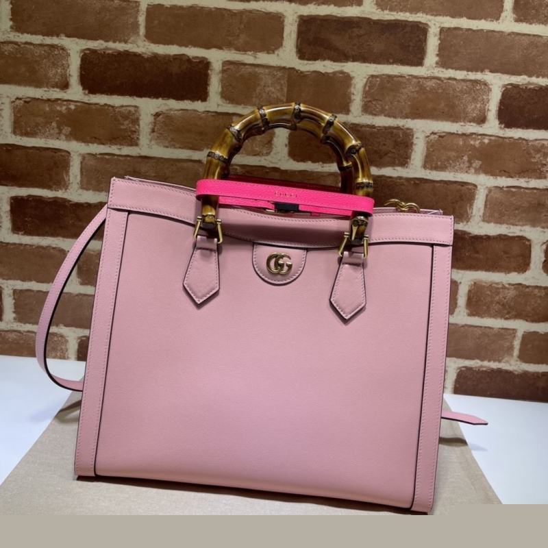 G*u*i top handle bags